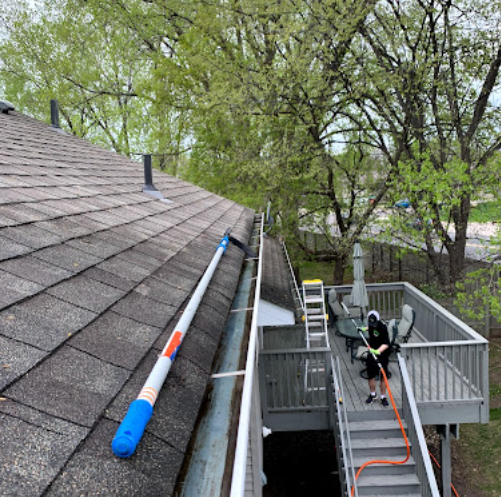 Gutter cleaning from rooftop